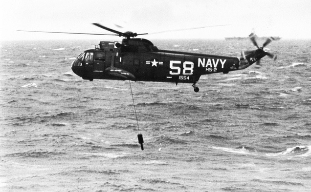 A US Navy SH-3A Sea King from Helicopter Anti-Submarine Squadron 2 (HS-2) “Golden Falcons” deploys its AN/AQS-13 dipping sonar. (US Navy)
